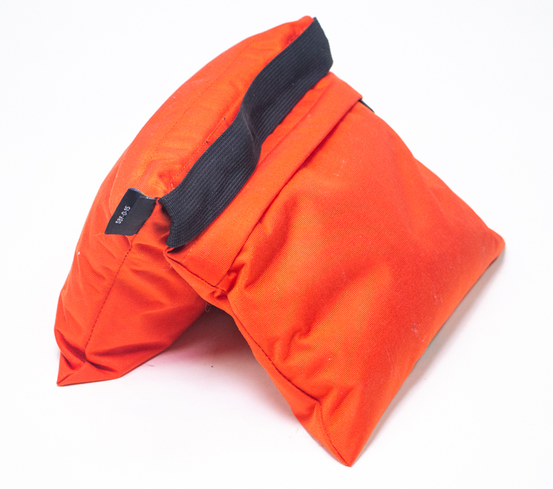 An orange saddle sandbag