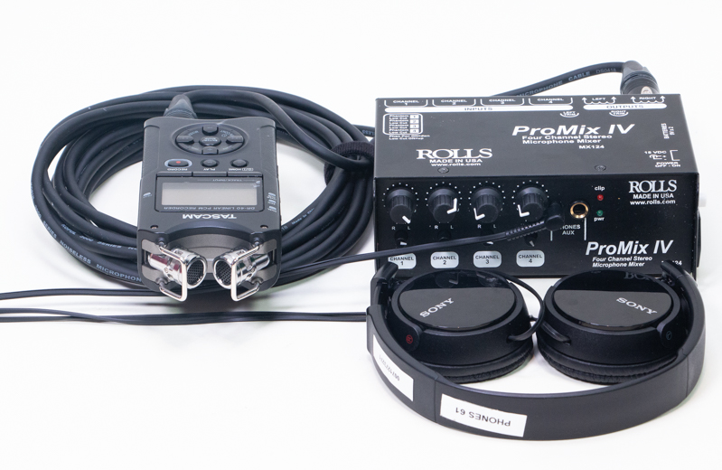 A Rolls ProMix IV four channel stereo microphone mixer, Sony headphones, a Tascam recorder, and wires 