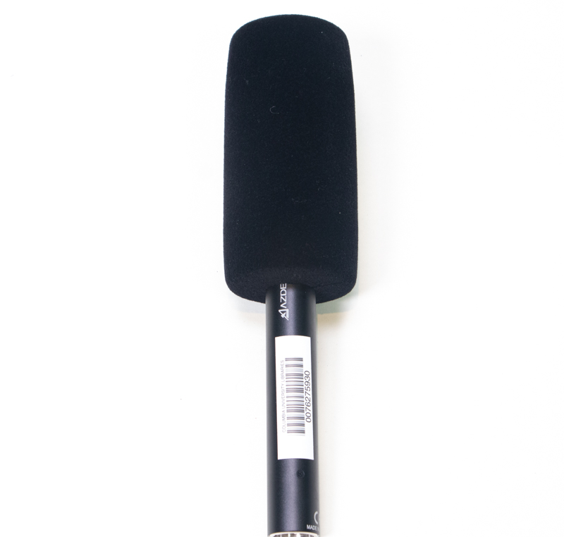 A black Azden microphone