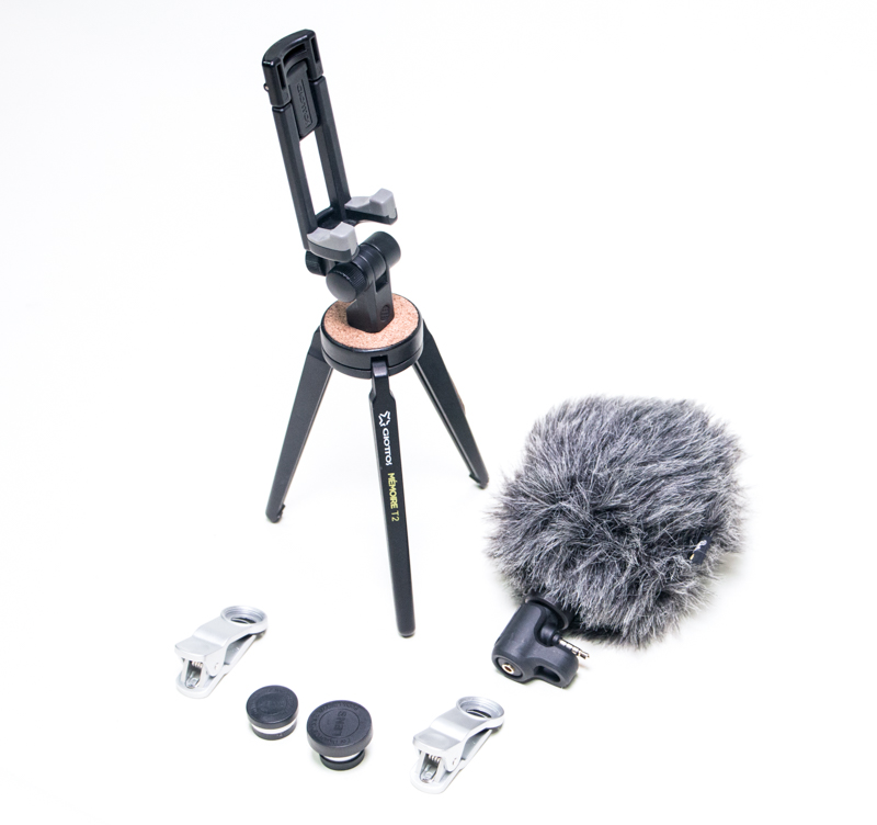 a Giottos Memoire T2 mini tripod, two clamps, two lenses, and a  microphone